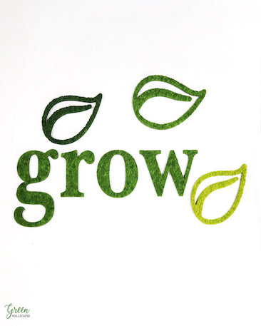 Green 'grow' text in moss with leaf symbols on a white background