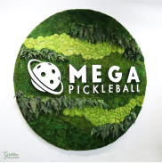 Circle of moss and ferns with a white logo that says 